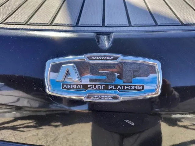 Slide: The Image of 2016 Chaparral Vortex 223 VRX Aerial Surf Platform badge. - 16