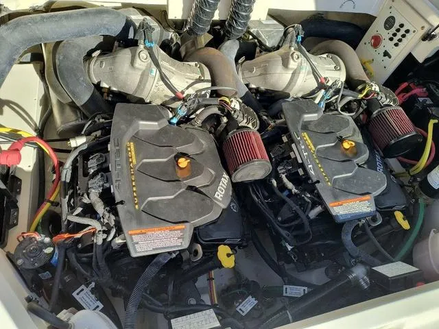 Slide: The Image of Engine compartment of 2016 Chaparral Vortex 223 VRX boat, showcasing dual Rotax engines. - 18