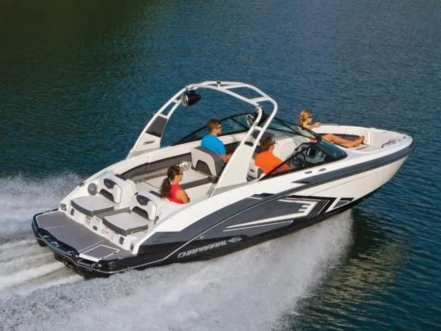 Slide: The Image of 2016 Chaparral Vortex 223 VRX speedboat cruising on a lake with passengers. - 8