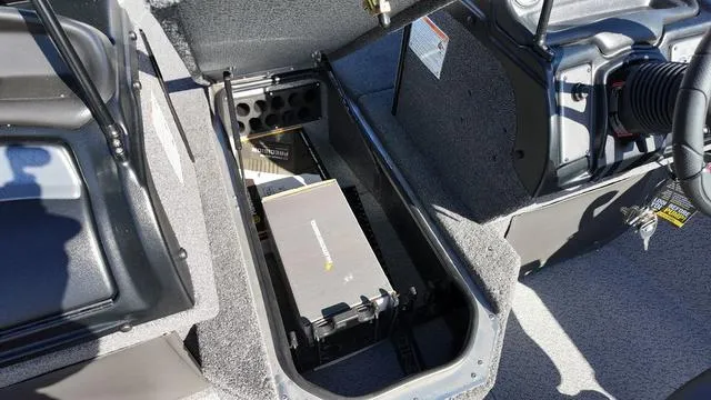 Slide: The Image of 2025 Lund 2075 Fisherman Sport boat interior storage compartment. - 6