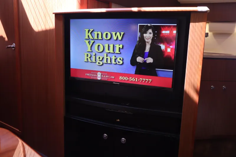 Slide: The Image of Television displaying "Know Your Rights" program inside 2016 Tiara Yachts 4300 Open. - 13