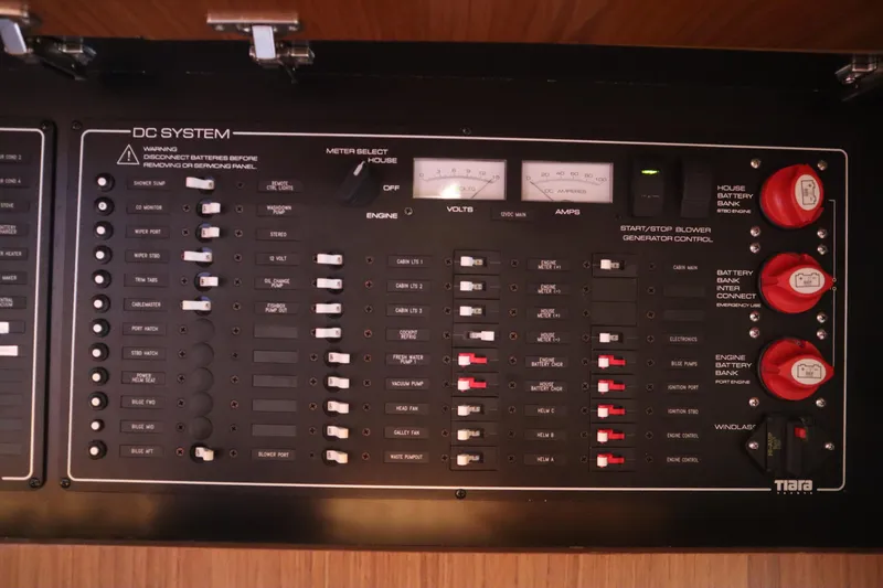 Slide: The Image of Control panel of a 2016 Tiara Yachts 4300 Open, featuring DC system switches and meters. - 3