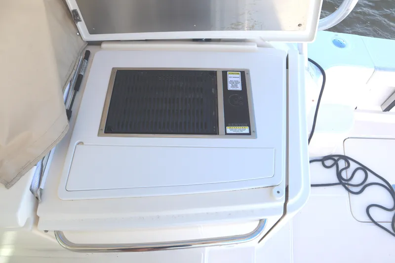 Slide: The Image of Tiara Yachts 4300 Open 2016 onboard grill with cover open. - 34