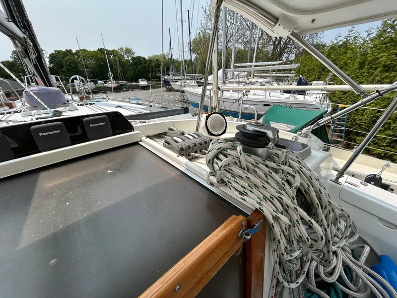 Slide: The Image of Sailboat deck view of 1994 Freedom 45 Aft Cockpit with ropes and equipment. - 11