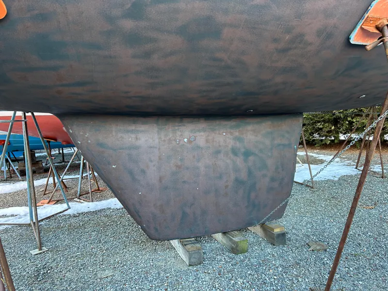 Slide: The Image of Keel of a 1994 Freedom 45 Aft Cockpit sailboat on stands. - 5