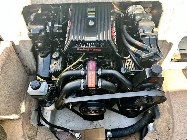 Slide: The Image of 1997 Sea Ray 210 Bowrider engine, 5.7L V8, Thunderbird ignition system. - 9