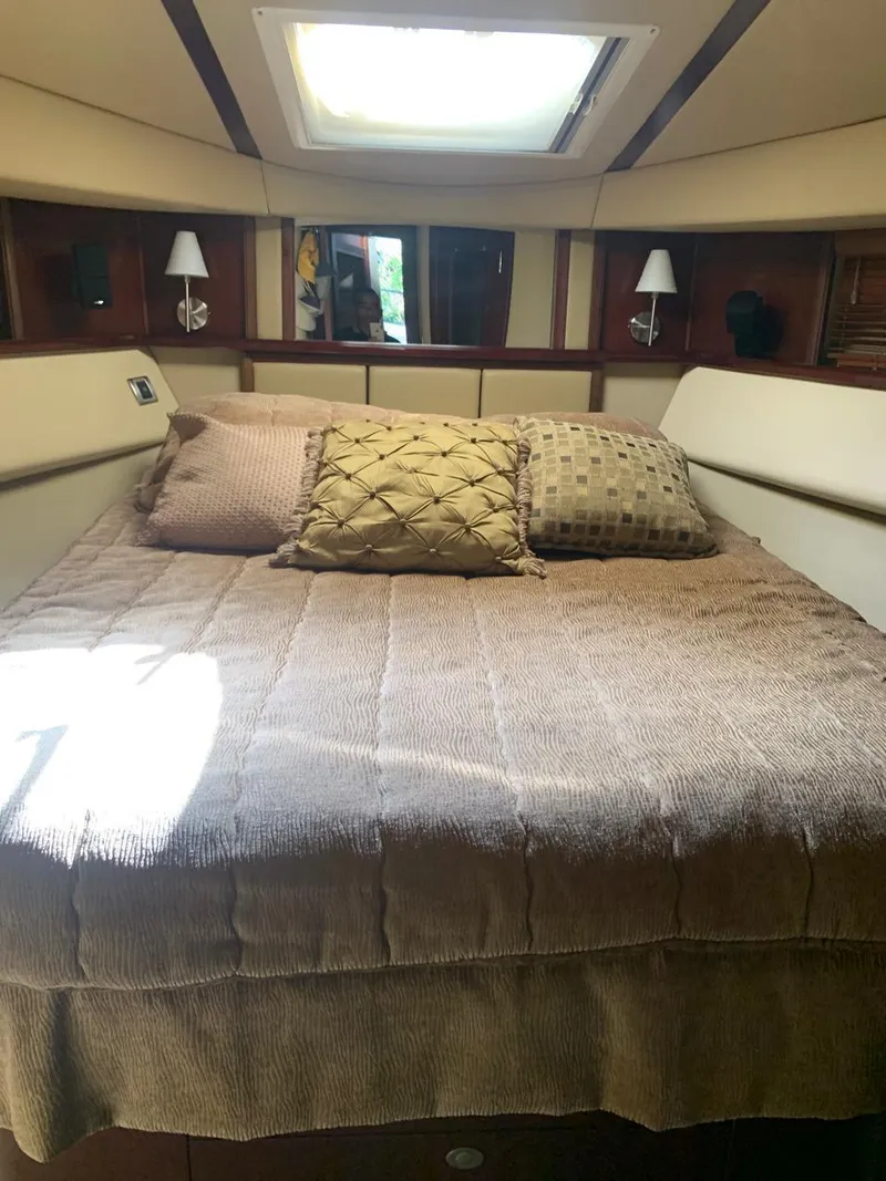 Slide: The Image of Luxurious bedroom interior of 2006 Sea Ray 52 Sedan Bridge yacht. - 12