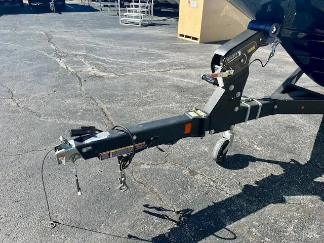 Slide: The Image of Trailer hitch of a 2018 Sea Ray SPX 210 boat on pavement. - 16
