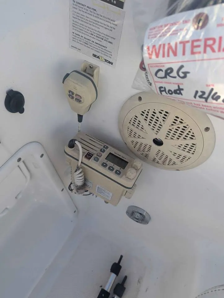 Slide: The Image of 2012 Sea Fox 236CC Pro Series boat interior with radio and speaker system. - 16