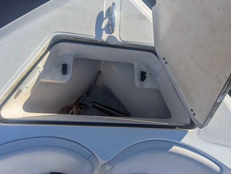 Slide: The Image of Open storage compartment on 2012 Sea Fox 236CC Pro Series boat. - 18