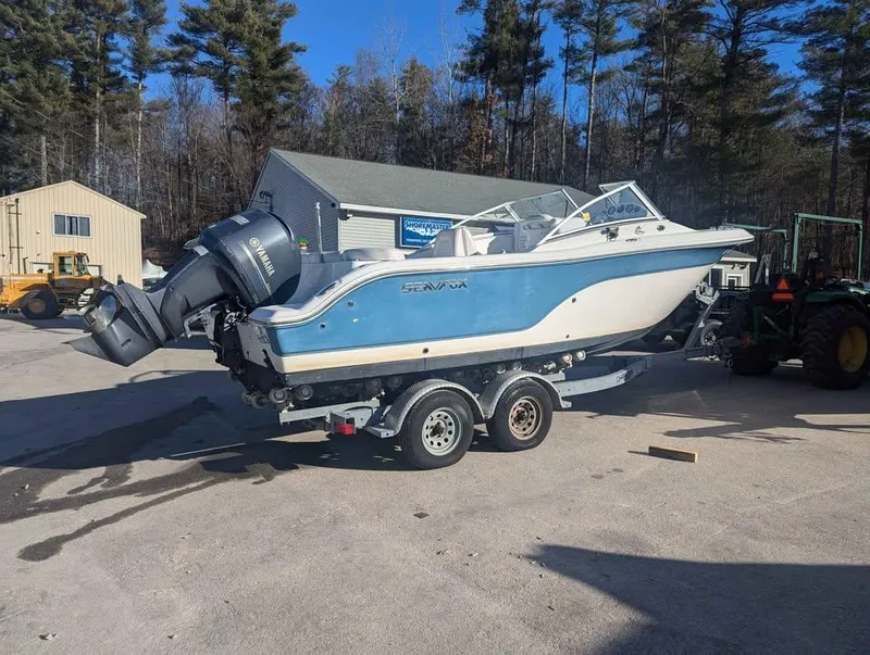 Slide: The Image of 2012 Sea Fox 236CC Pro Series boat on trailer, parked outdoors. - 4