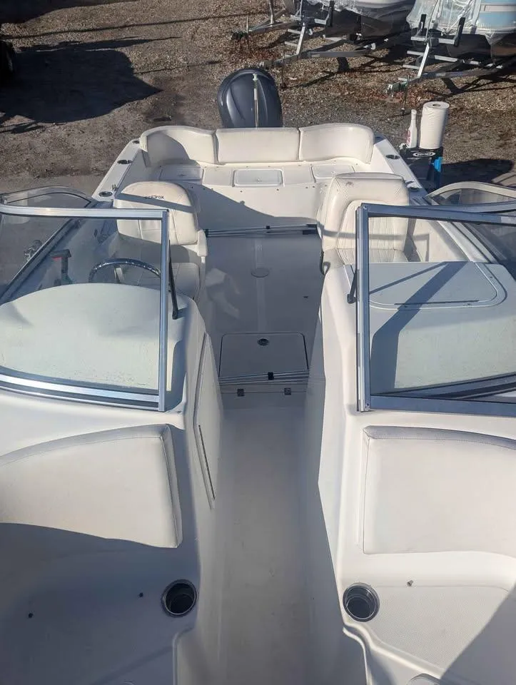 Slide: The Image of 2012 Sea Fox 236CC Pro Series boat interior with seating and windshield. - 7