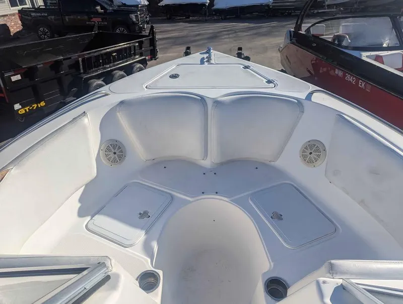 Slide: The Image of 2012 Sea Fox 236CC Pro Series boat interior, featuring spacious seating and storage compartments. - 9