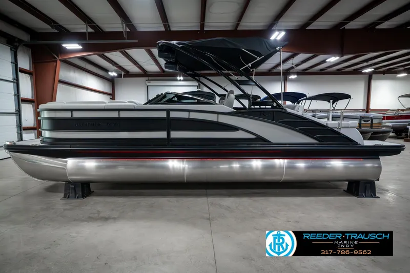 Slide: The Image of 2025 Bennington 23 RSBWA pontoon boat in showroom, side view. - 10