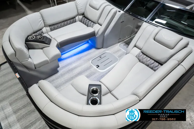 Slide: The Image of Luxurious interior of 2025 Bennington 23 RSBWA pontoon boat with LED lighting and plush seating. - 11