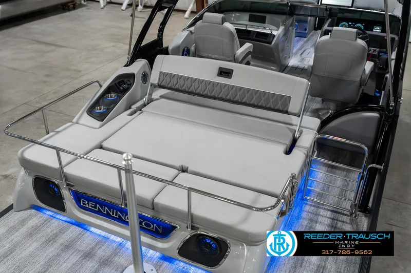 Slide: The Image of 2025 Bennington 23 RSBWA boat interior with luxurious seating and ambient lighting. - 13