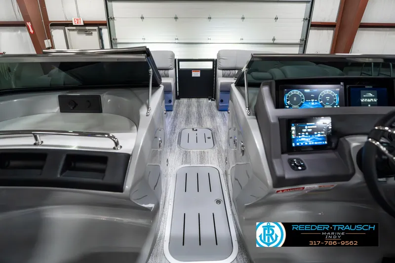 Slide: The Image of 2025 Bennington 23 RSBWA boat interior with modern dashboard and seating. - 19