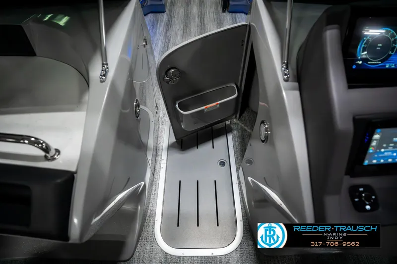 Slide: The Image of Interior view of a 2025 Bennington 23 RSBWA boat, featuring sleek design and modern controls. - 27