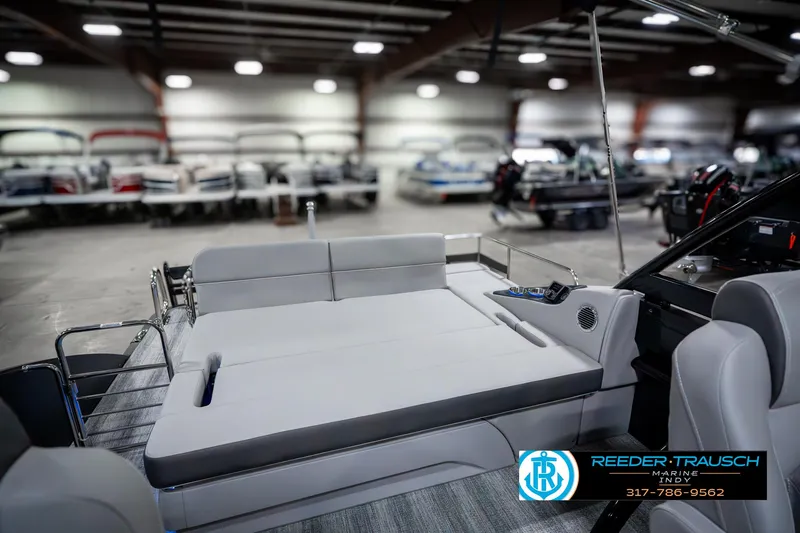 Slide: The Image of 2025 Bennington 23 RSBWA boat interior with spacious seating in a showroom. - 32