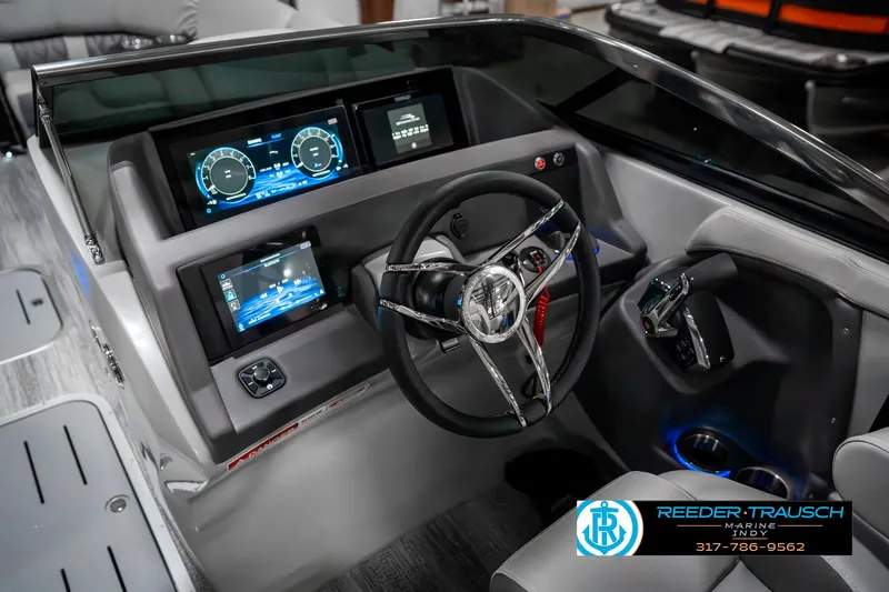 Slide: The Image of 2025 Bennington 23 RSBWA boat dashboard with modern controls and digital displays. - 35