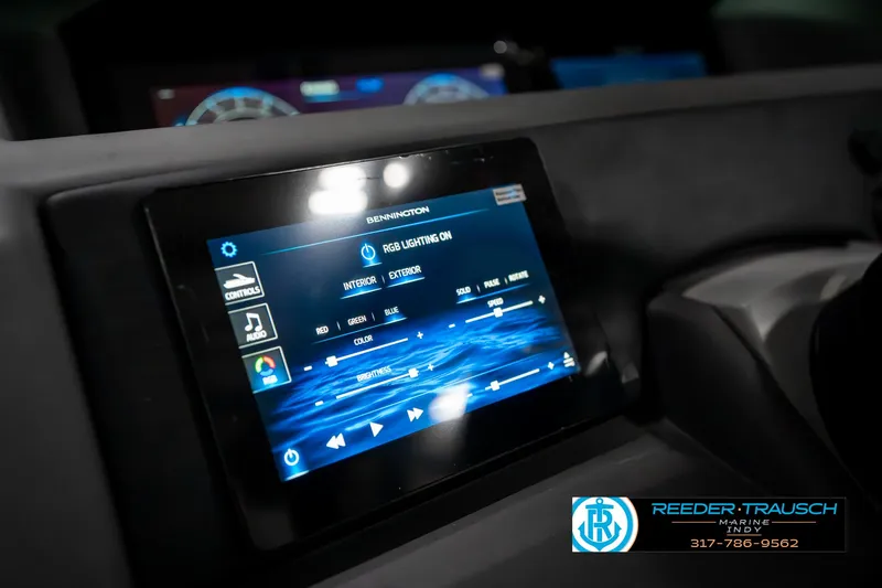 Slide: The Image of Touchscreen control panel in 2025 Bennington 23 RSBWA boat, displaying RGB lighting settings. - 38