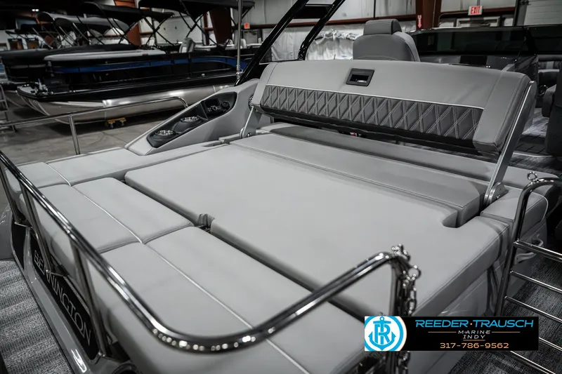Slide: The Image of 2025 Bennington 23 RSBWA luxury boat interior with plush seating in showroom. - 45