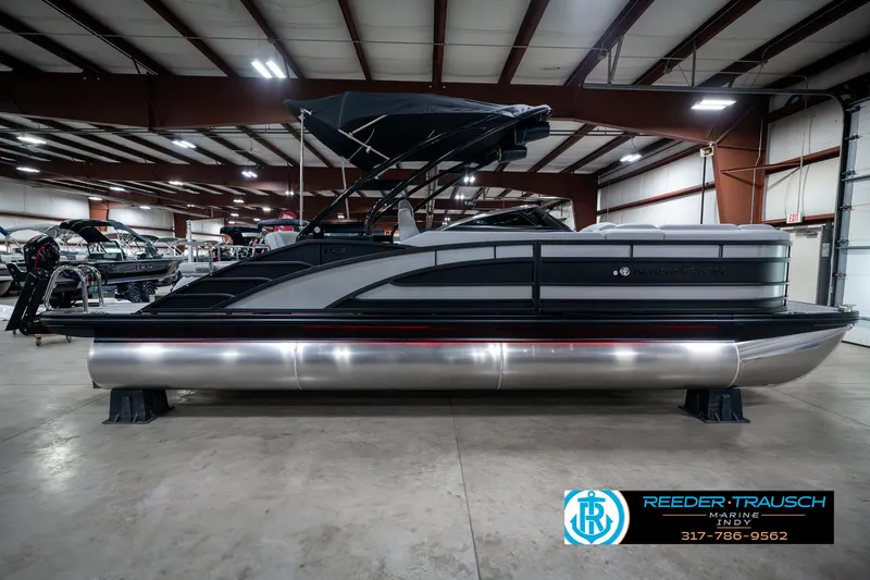Slide: The Image of 2025 Bennington 23 RSBWA pontoon boat in showroom, side view. - 6
