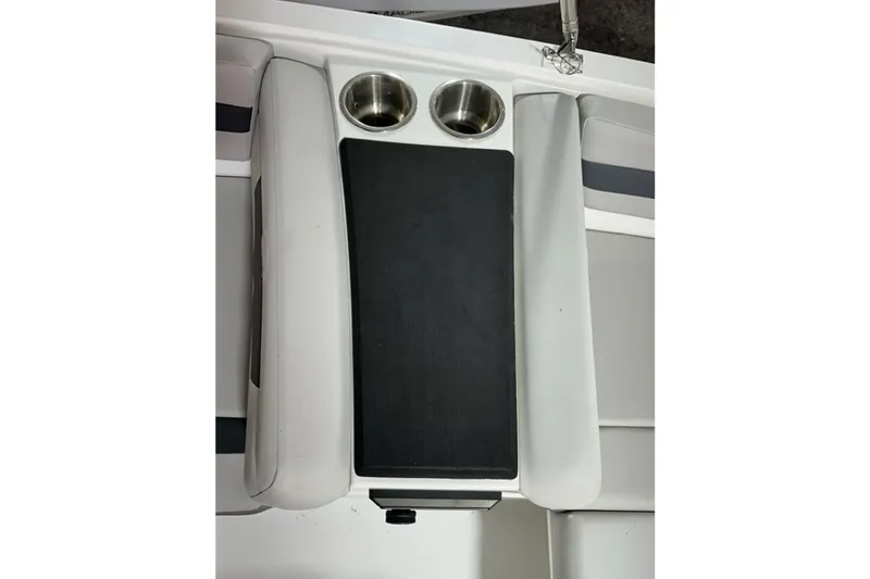 Slide: The Image of 2025 Hurricane SunDeck Sport 185 OB boat seating with cup holders and black center panel. - 11