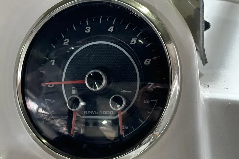 Slide: The Image of Close-up of 2025 Hurricane SunDeck Sport 185 OB tachometer displaying RPM gauge. - 7