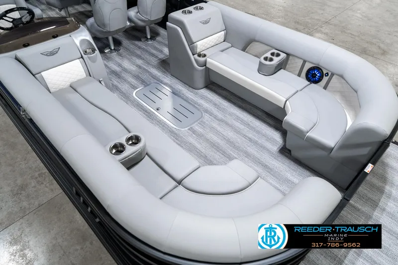 Slide: The Image of 2025 Bennington 25 LPD boat interior with luxurious seating and cup holders. - 13