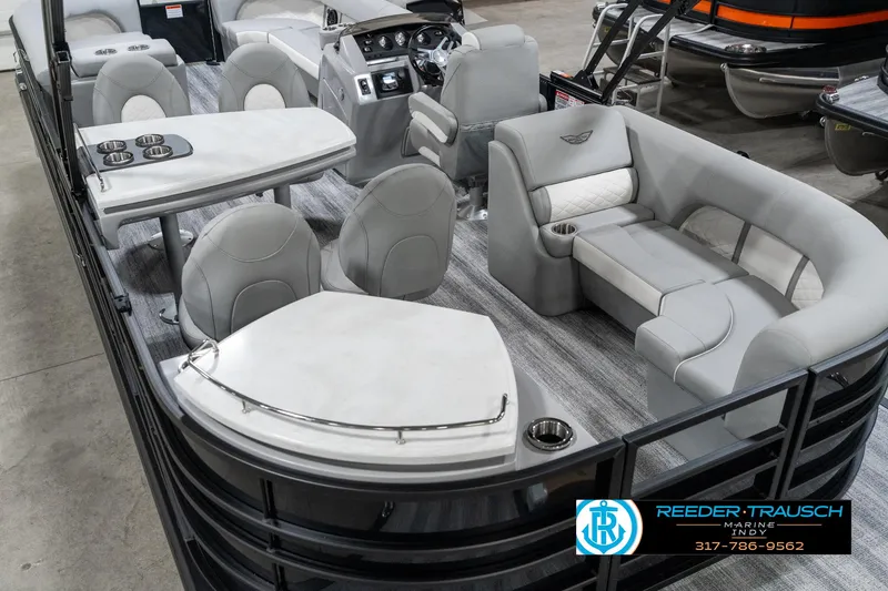 Slide: The Image of 2025 Bennington 25 LPD pontoon boat with luxurious seating and modern interior design. - 15