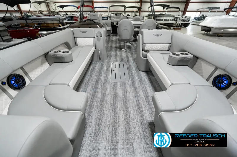 Slide: The Image of 2025 Bennington 25 LPD pontoon boat interior with luxurious seating and modern design. - 16