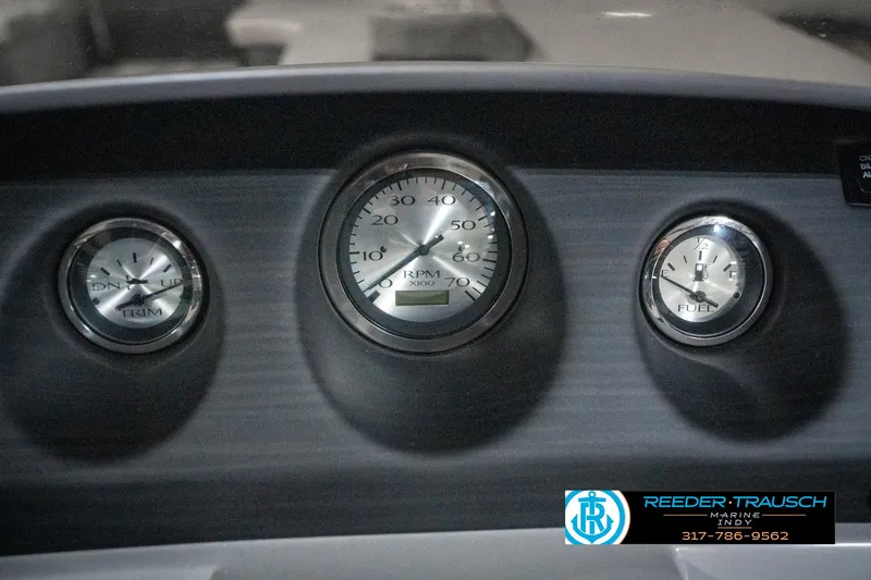 Slide: The Image of Dashboard gauges of 2025 Bennington 25 LPD boat, featuring trim and fuel indicators. - 40