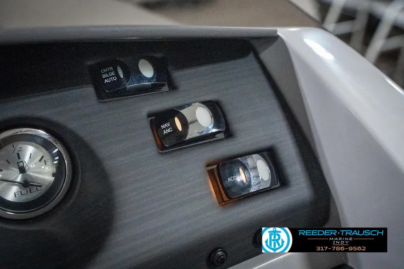 Slide: The Image of Control panel of 2025 Bennington 25 LPD boat with switches and fuel gauge. - 41