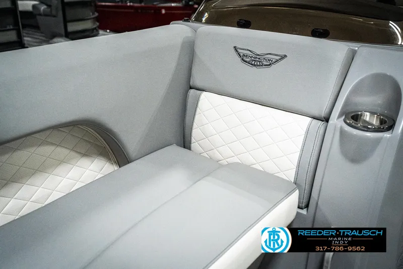 Slide: The Image of 2025 Bennington 25 LPD boat interior with luxurious gray and white seating. - 45