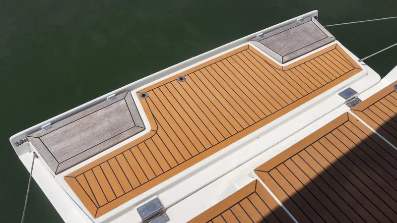 Slide: The Image of Hanse 505 2018 yacht deck with teak finish, featuring sleek design and durable materials. - 12