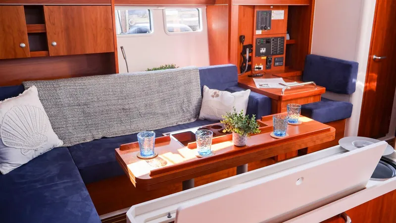 Slide: The Image of Luxurious interior of 2018 Hanse 505 yacht with cozy seating and elegant decor. - 16