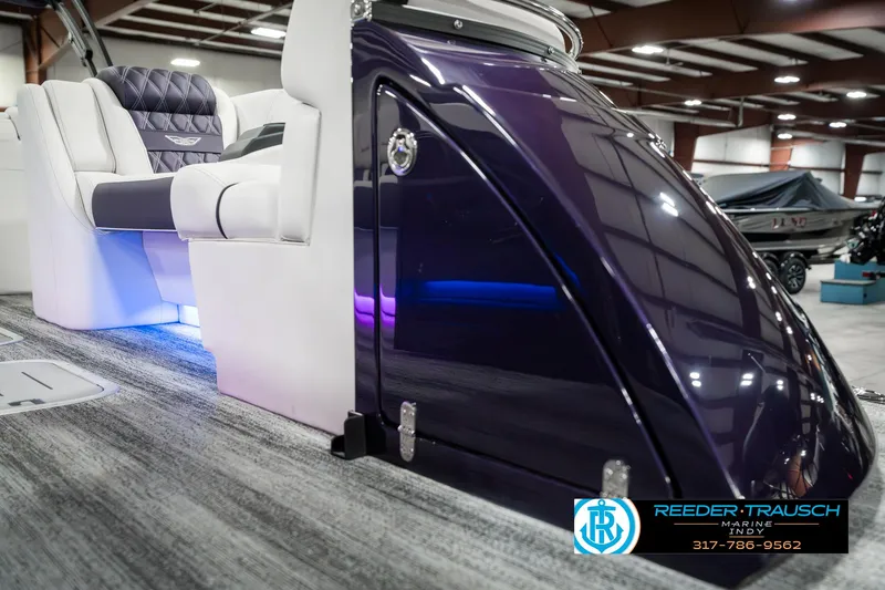 Slide: The Image of 2025 Bennington QX SB T2 boat interior with luxurious seating and modern design. - 24