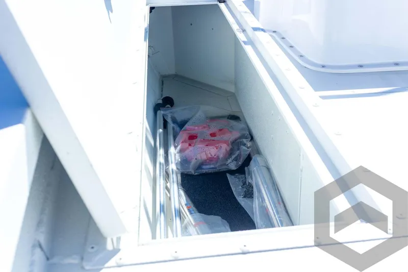Slide: The Image of Storage compartment of 2025 G3 Bay 21 GX boat, featuring equipment and accessories. - 37