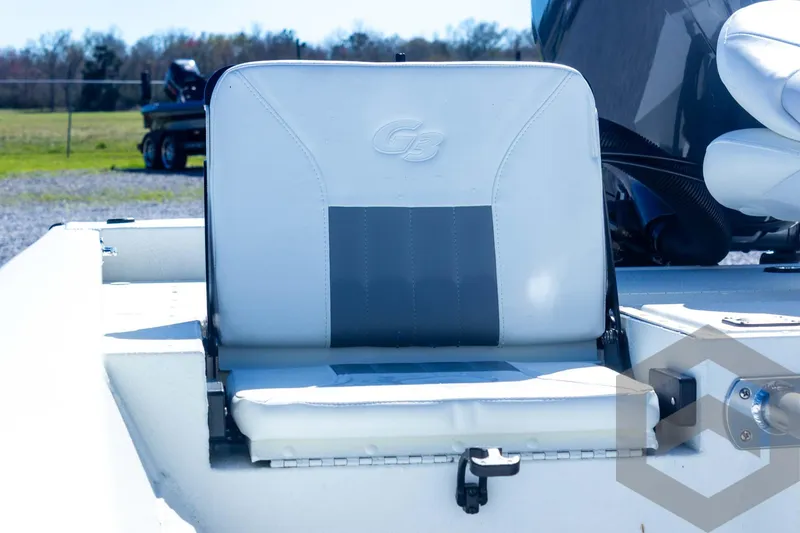 Slide: The Image of 2025 G3 Bay 21 GX boat seat, white and gray design, outdoor setting. - 41