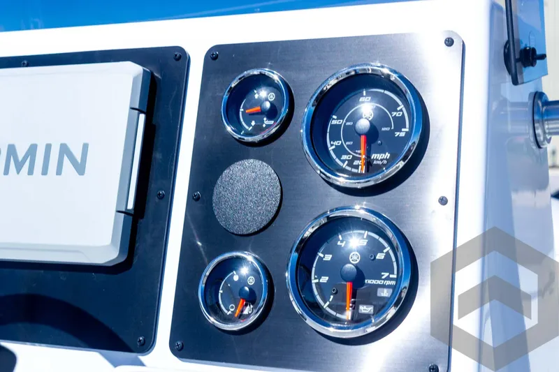 Slide: The Image of Dashboard of 2025 G3 Bay 21 GX boat with gauges and Garmin device. - 45