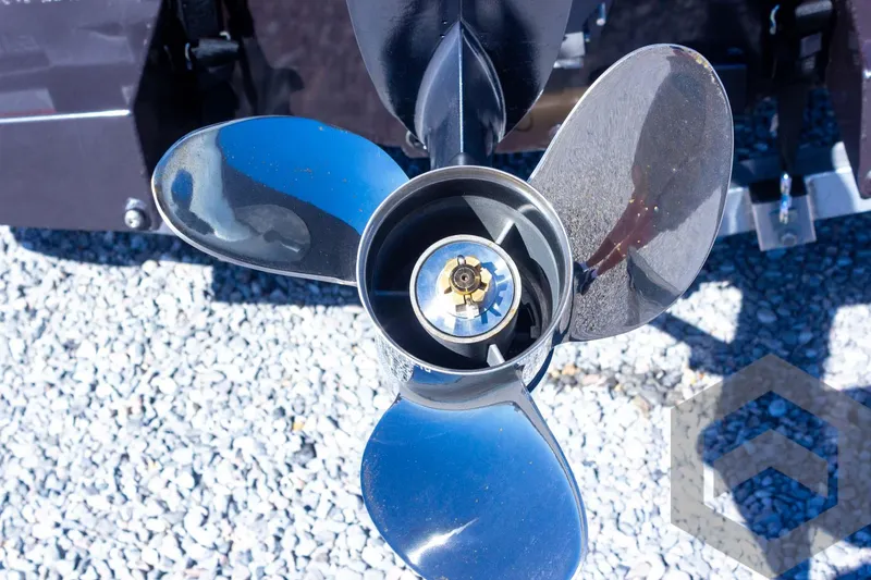 Slide: The Image of Propeller of 2025 G3 Bay 21 GX boat on gravel surface. - 49