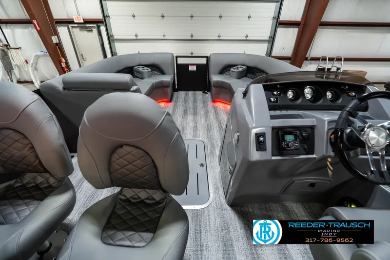 Slide: The Image of Interior of 2025 Bennington 23 LPD pontoon boat with modern seating and dashboard. - 20