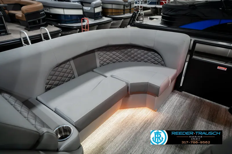 Slide: The Image of Luxurious seating on 2025 Bennington 23 LPD pontoon boat with ambient lighting. - 26