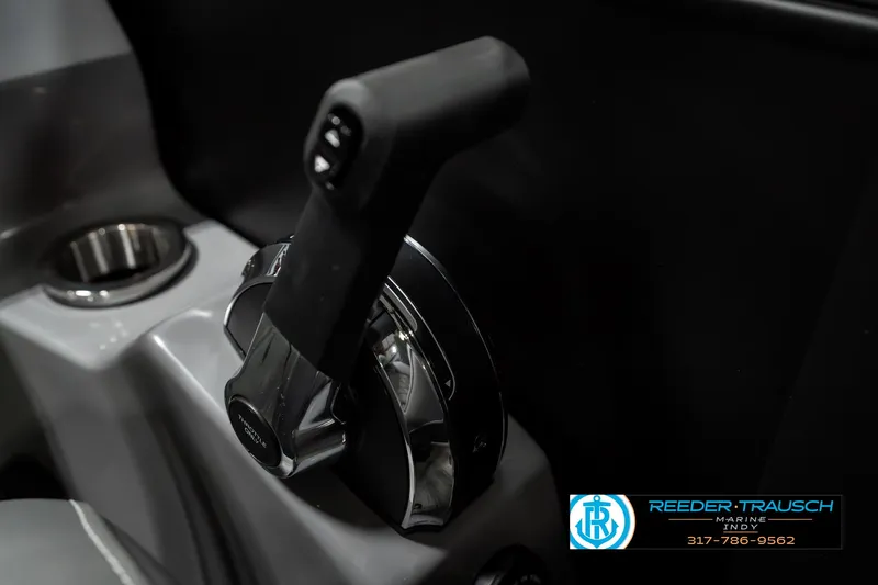 Slide: The Image of Throttle control of 2025 Bennington 23 LPD boat, featuring sleek design and ergonomic handle. - 38