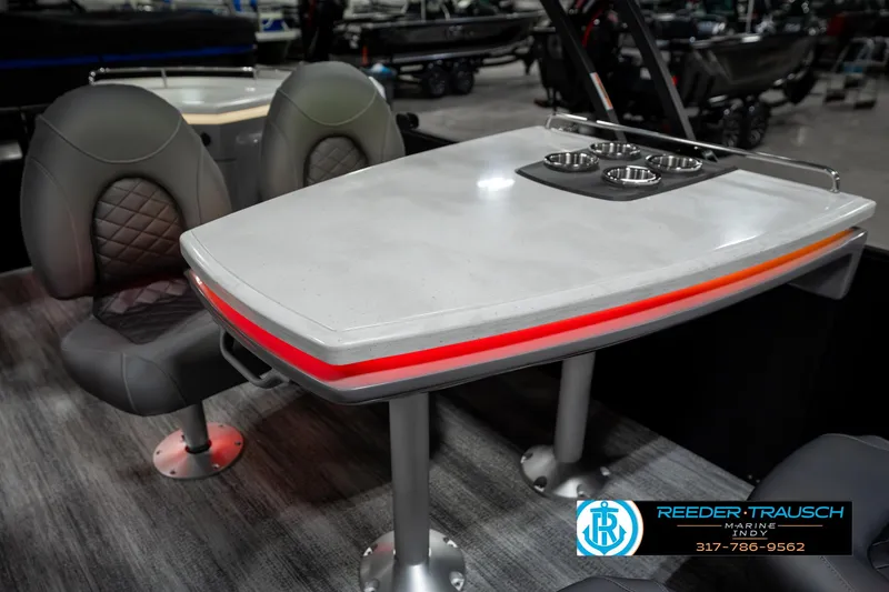 Slide: The Image of 2025 Bennington 23 LPD boat interior with modern table and seating. - 45