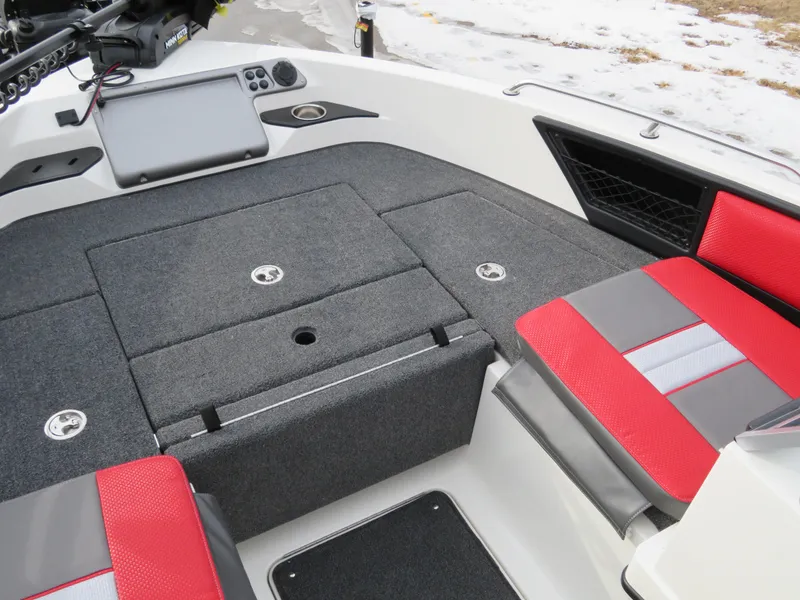 Slide: The Image of 2025 Ranger 1850MS boat interior with red and gray seating, storage compartments, and control panel. - 12