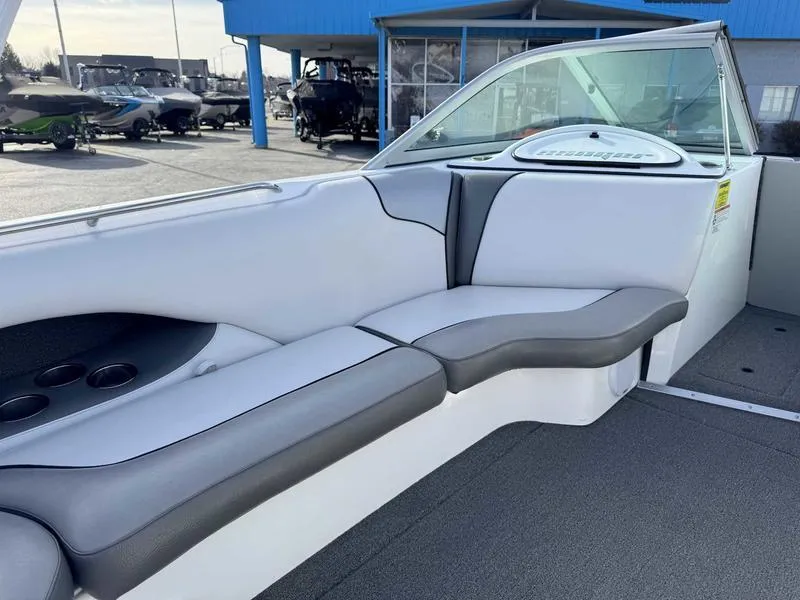 Slide: The Image of 2017 Sanger V215 XTZ boat interior with gray seating and cup holders. - 11