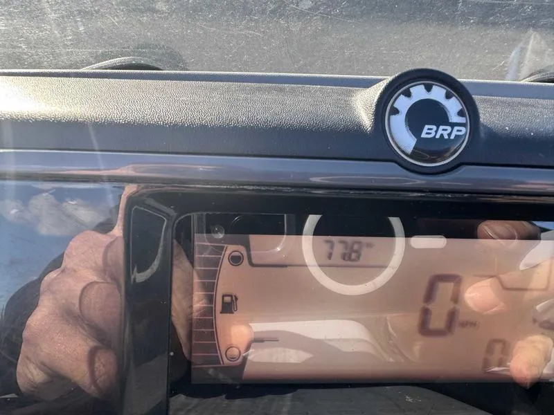 Slide: The Image of Dashboard of 2023 Sea-Doo Switch Cruise 18' with BRP logo and digital display. - 13