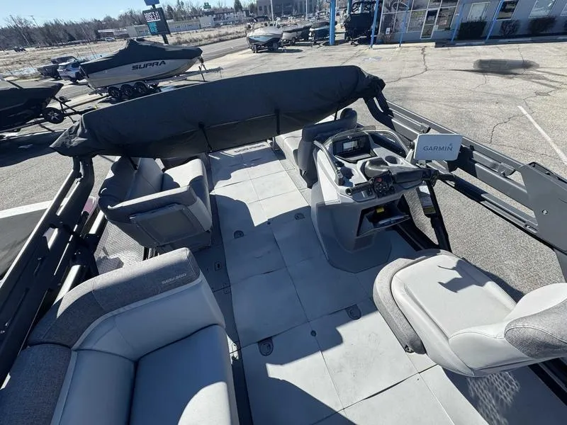 Slide: The Image of 2023 Sea-Doo Switch Cruise 18' interior with seating and control console. - 3